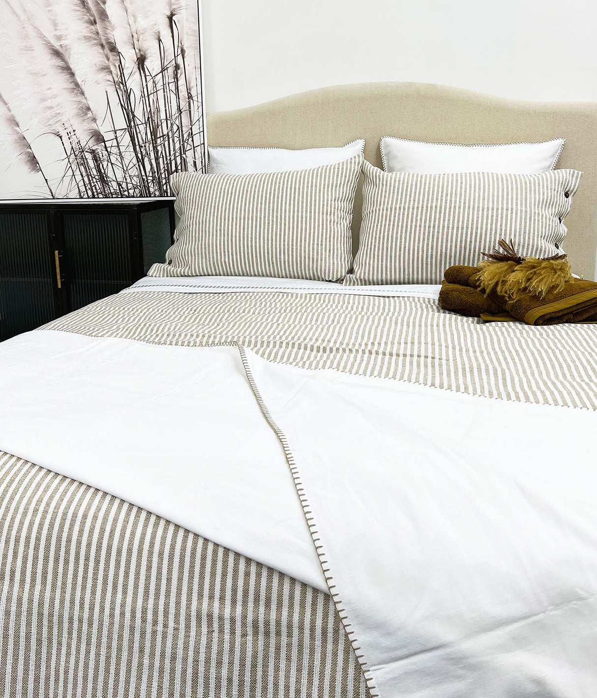 Super King duvet cover in natural striped design, crafted from a linen-cotton blend for comfort and style.