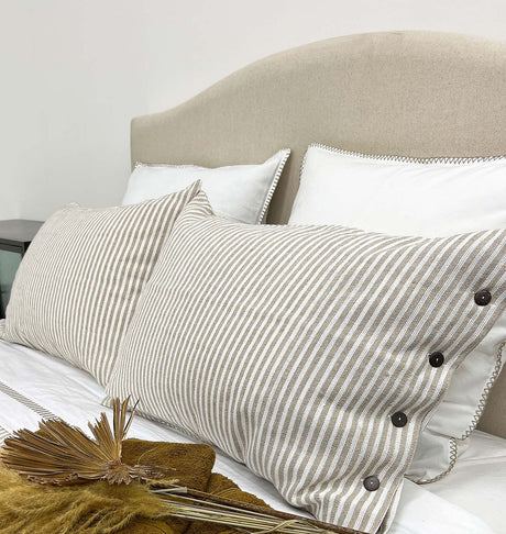 Natural striped pillowsham with button closure, crafted from linen-cotton blend for comfort and style, measuring 70cm.