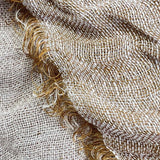 Reversible KENT Ochre throw in 100% linen, featuring a distressed eyelash edge, measuring 125 x 150cm.