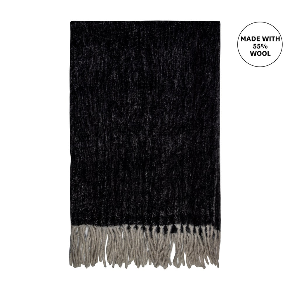 Luxurious black mohair blend throw with bumble fringe, measuring 130 x 170 cm, perfect for warmth and style.