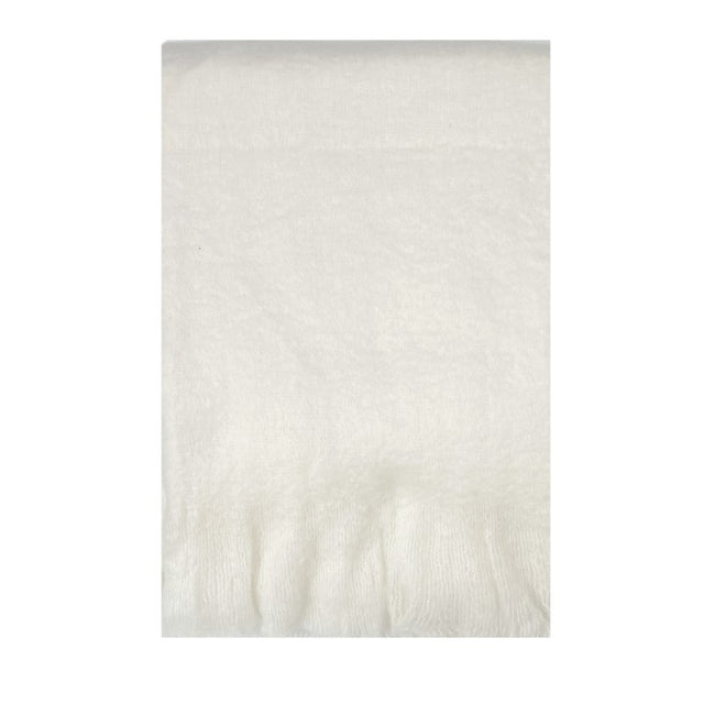 Luxurious ivory mohair blend throw with eyelash fringe, measuring 130 x 170cm, perfect for cozying up in style.