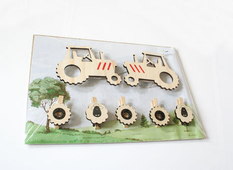 Tractor-themed wall art pegs made from durable pine, perfect for displaying children's artwork and photos creatively.