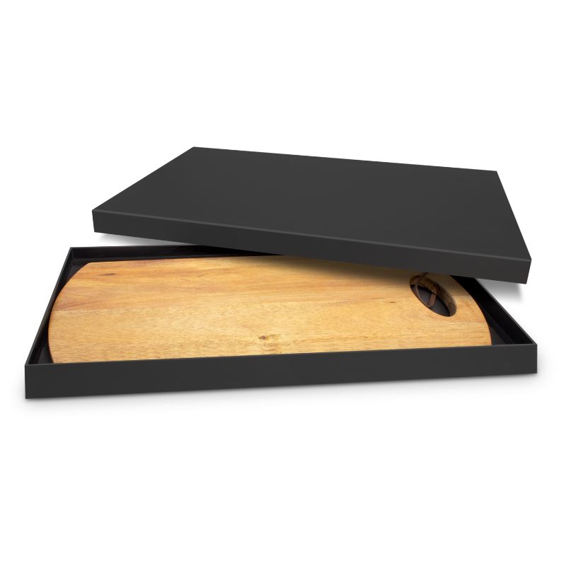 Natural acacia wood serving board with leather strap, ideal for charcuterie, presented in an elegant black gift box.