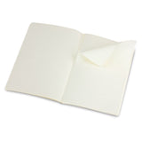 Set of three Moleskine Volant Large White journals with ivory lined pages, ideal for capturing ideas and sketches.