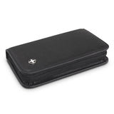 Luxury black manicure set featuring stainless steel tools, elegant PU case, and Swiss Peak badge for stylish grooming.