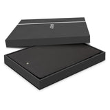 Elegant black A5 portfolio with zipper, featuring a phone stand, card slots, and high-quality notepad, in a Swiss Peak gift box.
