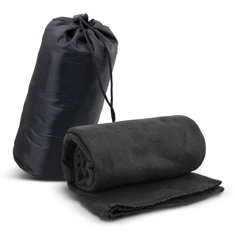 Soft black fleece blanket in a durable carry bag, perfect for home comfort and outdoor adventures, measuring 1200mm x 1500mm.