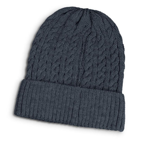 Navy knit beanie with chunky cable pattern and roll-up cuff, perfect for winter style and warmth for all.