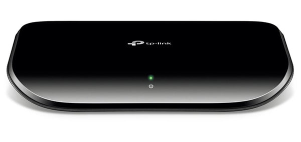 TP-Link SG1005D 5-Port Gigabit Switch in a sleek plastic case for easy desktop or wall installation, supporting fast network connections.