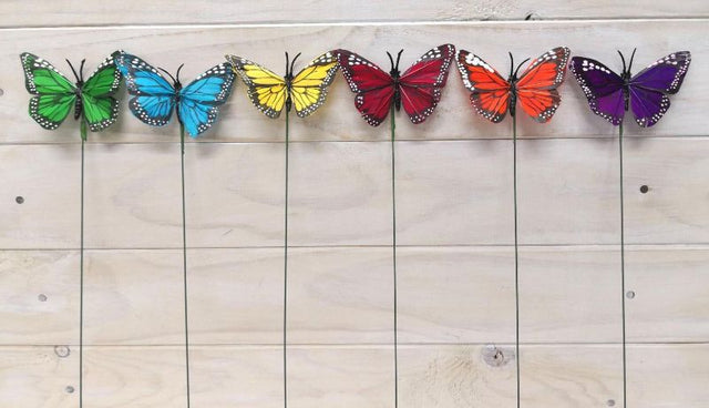 Vibrant 3.75" butterfly picks with intricate details, perfect for enhancing floral arrangements and crafts (pack of 12).