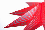 Vibrant 60cm red star lantern lamp shade, crafted from thick patterned paper, perfect for festive decor and charming displays.