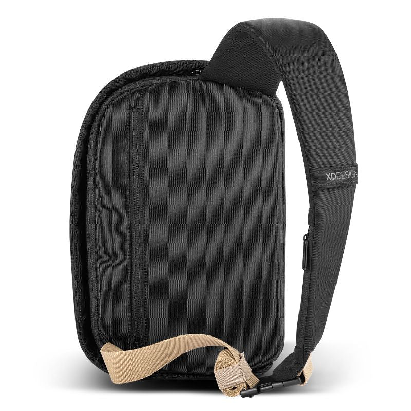 Bobby Sling Bag in black, designed for urban safety with anti-theft features, USB charging, and eco-friendly materials.