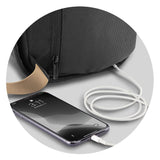Bobby Sling Bag in black, featuring anti-theft design, USB charging, and eco-friendly RPET materials for urban travel safety.