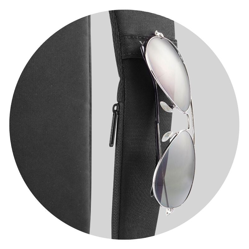 Bobby Sling Bag in black, featuring anti-theft tech, adjustable strap, USB port, and eco-friendly RPET materials.