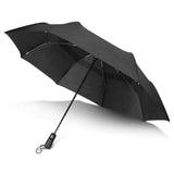 A sleek black tri-folding umbrella with a 1050mm canopy, automatic opening, and durable vented nylon for wind resistance.