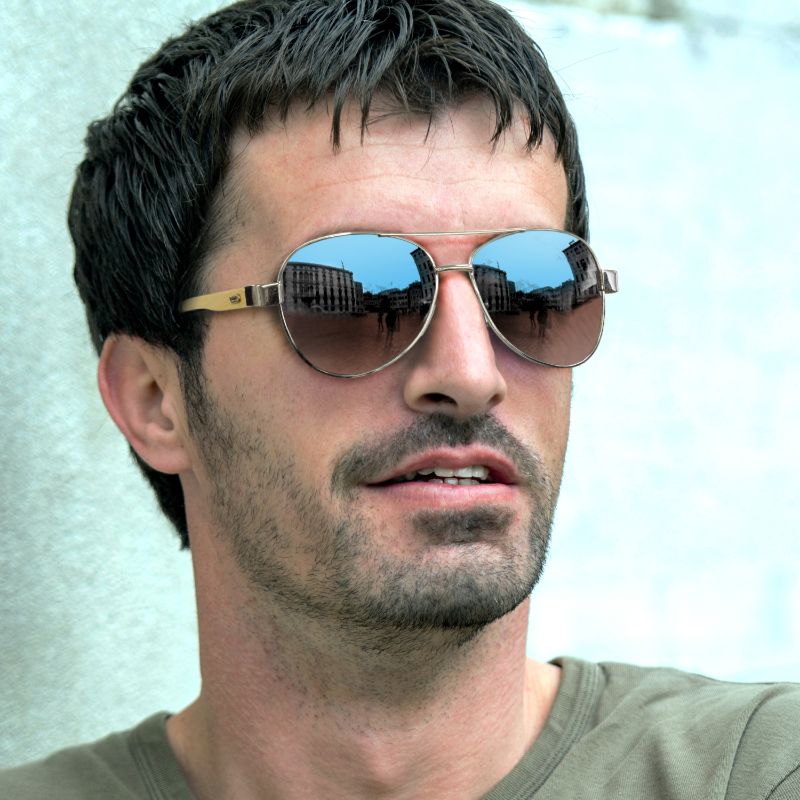 A set of 6 stylish aviator sunglasses with mirror lenses, bamboo arms, and UV 400 protection, ideal for eco-conscious fashion.