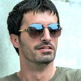A set of 6 stylish aviator sunglasses with mirror lenses, bamboo arms, and UV 400 protection, ideal for eco-conscious fashion.