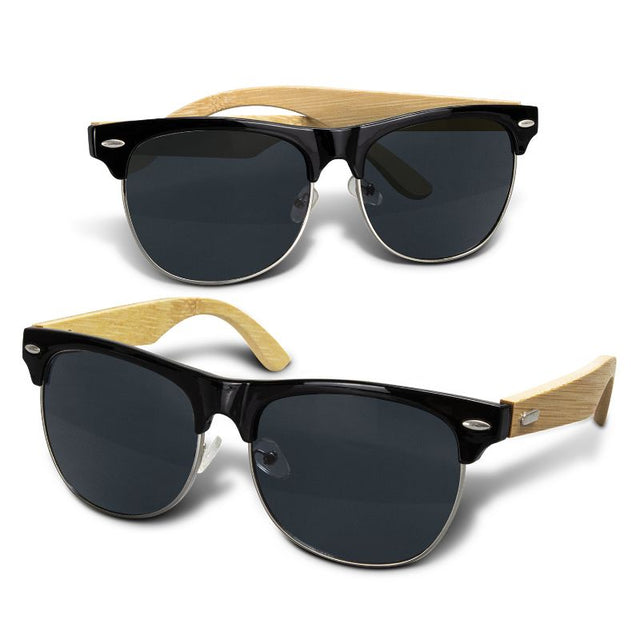 Sunglasses with polished ABS frame and bamboo arms, offering UV400 protection in a sustainable design.