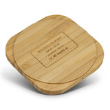 Eco-friendly square bamboo wireless charger set (6 units) for efficient 5W charging of modern devices, presented in recyclable gift box.