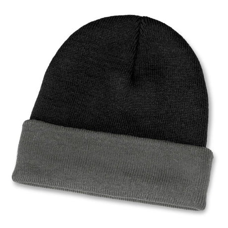Warm two-toned black and grey acrylic beanie with roll-up cuff, perfect for winter style and comfort.