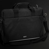 Sleek black Swiss Peak RFID laptop bag with a padded compartment, multiple pockets, and reflective safety strip for commuters.