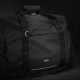 Black Swiss Peak RFID Sports Duffle Bag with laptop compartment, shoe pockets, and RFID protection for secure travel.
