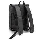 Sleek black Moleskine Metro Slim Backpack with magnetic flap, water-resistant zip, and organized compartments for urban adventures.