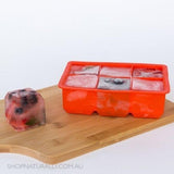 Avanti Red Silicone Ice Cube Tray for 6 jumbo cubes, perfect for chilling drinks and versatile kitchen uses.