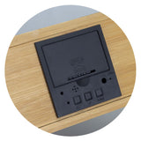 Wireless Charging Clock in natural bamboo with LED display, alarm, date, temperature, and 5W wireless charging pad.