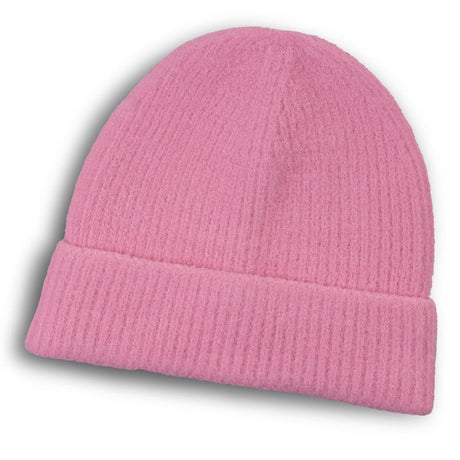 Soft pink brushed beanie with thick cuff, perfect for warmth and style; pack of 6 units for versatile winter fashion.
