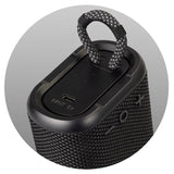 Compact black outdoor Bluetooth speaker Loki with IPX7 water resistance, 5W power, and 3-hour playtime for adventures.