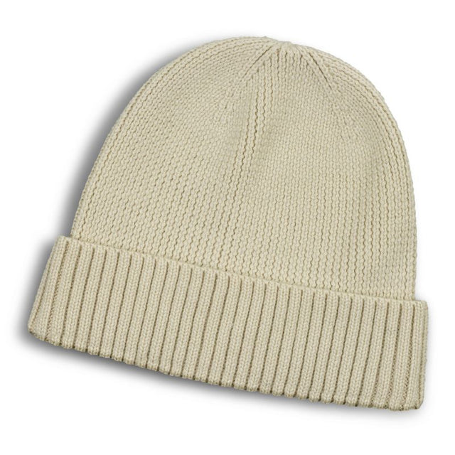 Ecru Merino Wool Beanie featuring a roll-up cuff, soft, durable, and lightweight for winter warmth and style.