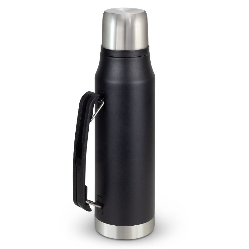 Black stainless steel Wayfarer flask with double-wall vacuum, screw-on cup, and carry handle for hot drinks on the go.