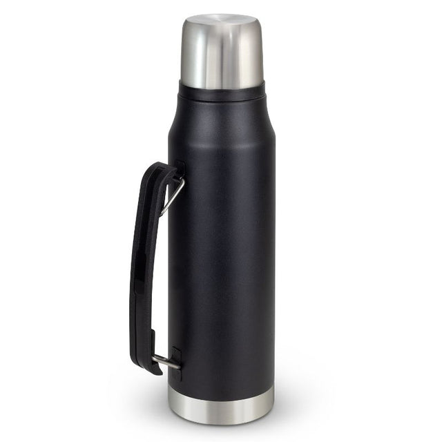 Black stainless steel Wayfarer flask with double-wall vacuum, screw-on cup, and carry handle for hot drinks on the go.