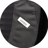Osprey Arcane Large Day Backpack in black with padded laptop sleeve, J-zip front, and self-locking hook for secure daily use.
