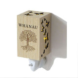 Whanau Wood Grain Plug In Night Light featuring a charming wood finish, ideal for children's rooms and hallways with gentle LED illumination.