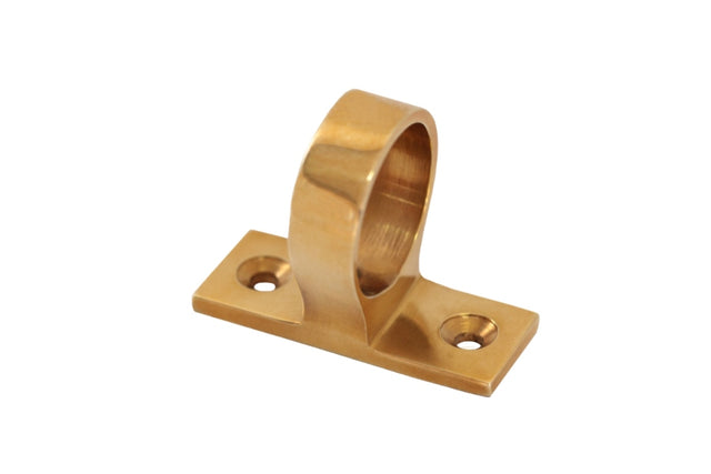 Elegant polished brass ring lift for sash windows, measuring 32 x 46 x 35 mm, enhances decor with timeless style.