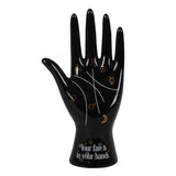 Black ceramic palmistry hand ornament with gold astrology symbols and 'Your fate is in your hands' inscription, stylish home decor.