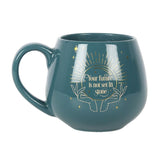 Green Fortune Teller Colour Changing Mug with mystical design that reveals hidden message when filled with hot liquids.