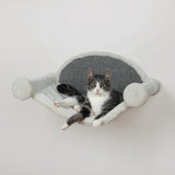 Wall-mounted cat hammock in white and grey, featuring plush cover and sisal scratching surface for comfort and play.