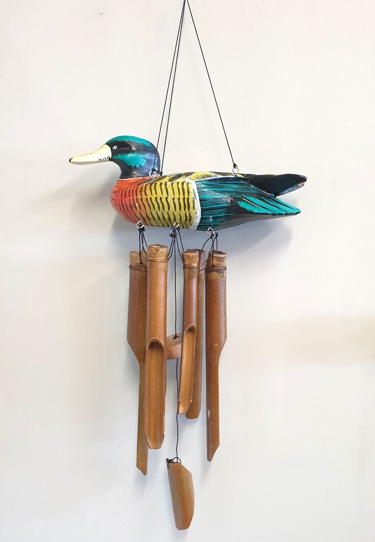 Duck Bamboo Wind Chimes with carved duck designs, eco-friendly bamboo, and soothing melodies for outdoor decor.