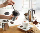 Adjustable hand coffee grinder Lorenzo by GEFU, stainless steel with 11 grind settings for perfect coffee consistency.