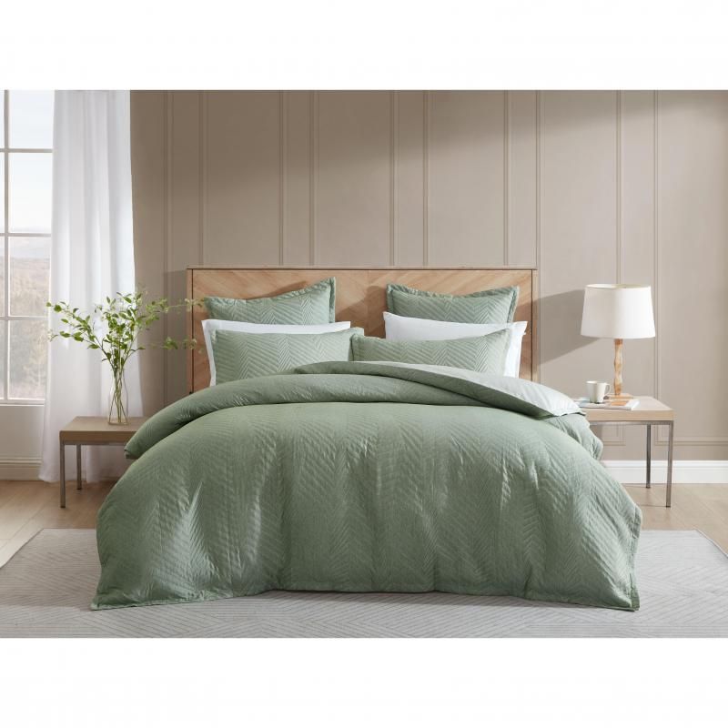 Luxurious King duvet set in eucalyptus with jacquard chevron pattern, soft texture, and durable cotton-polyester blend.