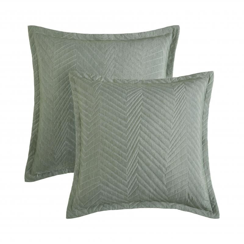 Elegant eucalyptus European pillowcase with skewed chevron design and soft quilted texture for stylish bedroom decor.