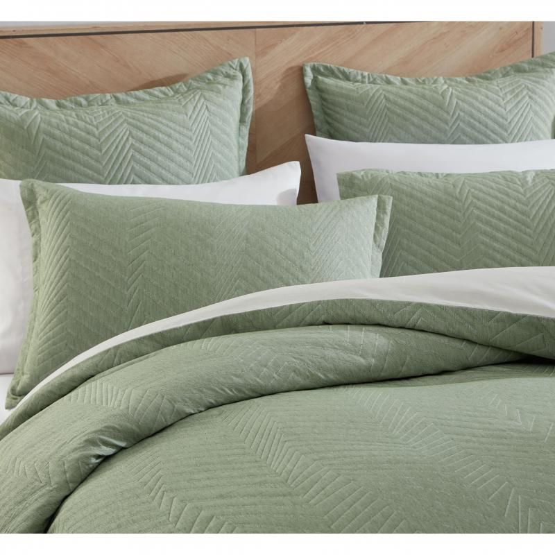 Elegant eucalyptus jacquard European pillowcase with chevron pattern and light quilting for added texture and softness.