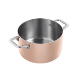 Scanpan Maitre' D 20cm Dutch oven with copper exterior and stainless steel interior for even cooking and elegant presentation.