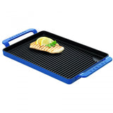 Sky blue cast iron rectangular grill by Chasseur, ideal for searing meat and vegetables, designed for style and quality cooking.