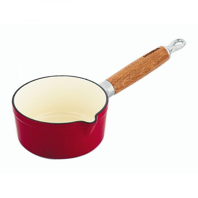 CHASSEUR 14cm Milk Pan in Federation Red featuring a pour spout, cast iron construction, and a cool wooden handle.