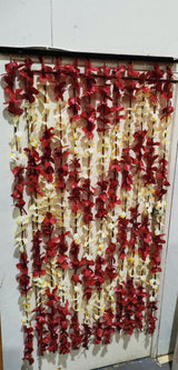 Elegant bead curtain featuring a unique leaf design, perfect for privacy and decor in any indoor space.