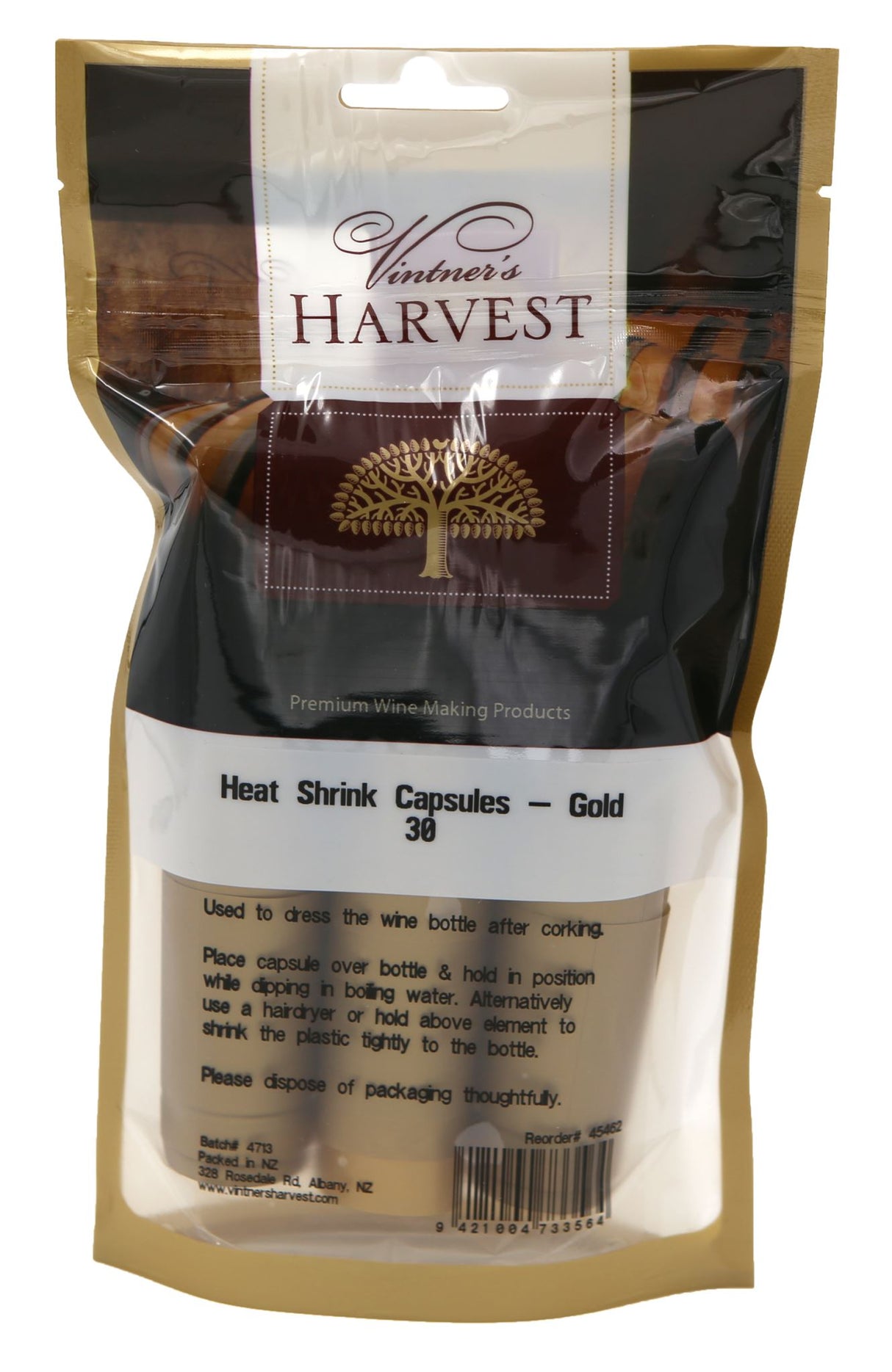 Elegant gold heat shrink capsules for wine bottles, ensuring a polished finish and protection against leaks and tampering.